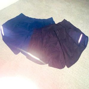 Set of two lulu lemon shorts, 1 black & 1 true navy, both women’s size 8 tall
